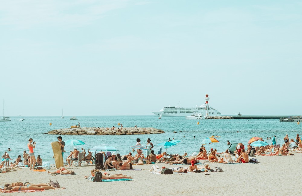 Tourists on a Beach in Cannes, France - (How to travel France - Best Tips and Guides)